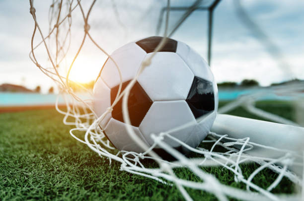 soccer ball into the goal